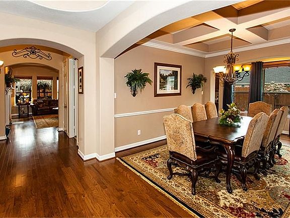 This Dining Room is Fantastic from Wood Floors to the Amazing Ceiling!