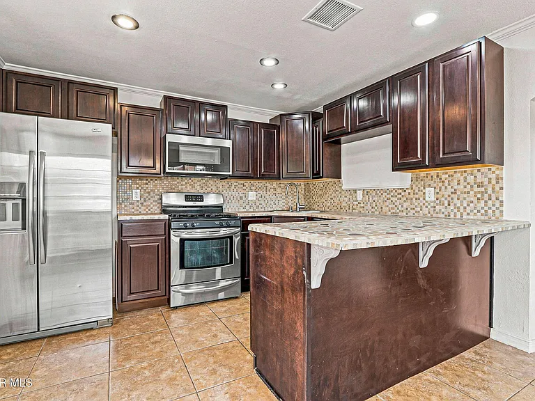 6340 Modesta St — Photo 35