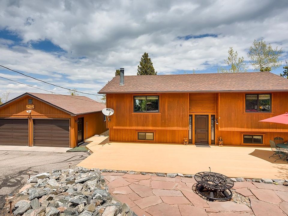 Welcome Home! This beautifully updated home is filled with sun, has wonderful outdoor spaces and a great view of the Denver skyl