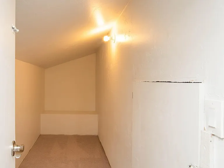 Walk in storage closet, ideal for seasonal decor storage