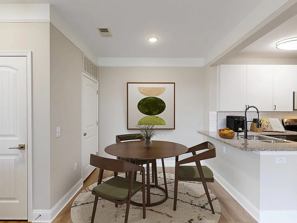 Newly Renovated Dining Room with Hardwood-Style Flooring