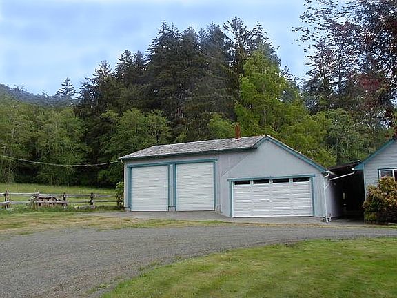 2 car garage and 3 Bay Doors
