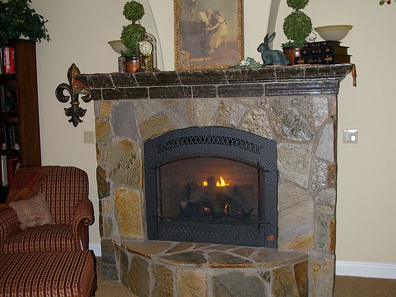 Gorgeous stone gas fireplace in great room