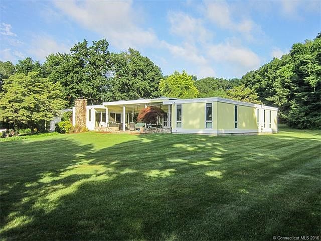 Stunning contemporary ranch on beautiful 2.61 level lot