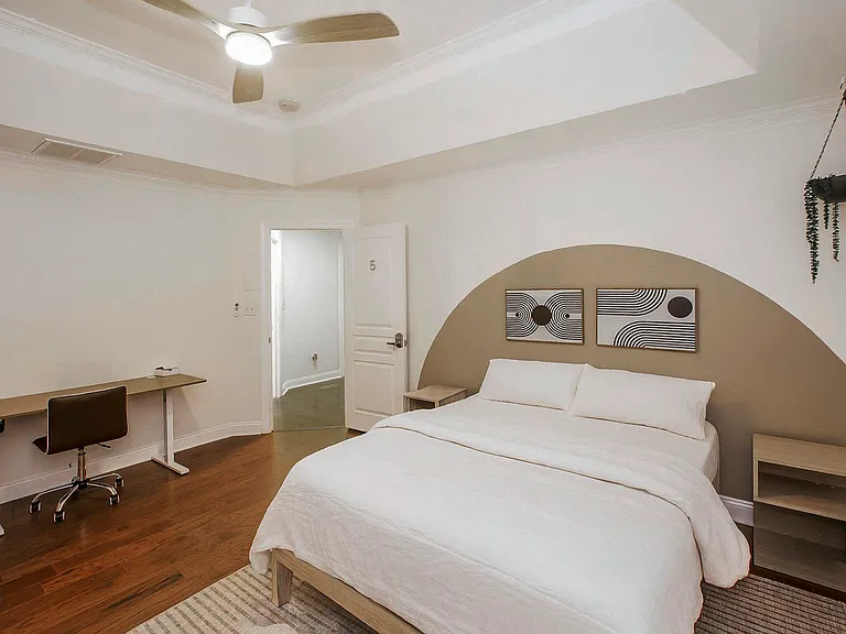 Master Room with a brand new smart TV, mini 2-door fridge, electric standing desk, quiet fan and a huge walking closet.