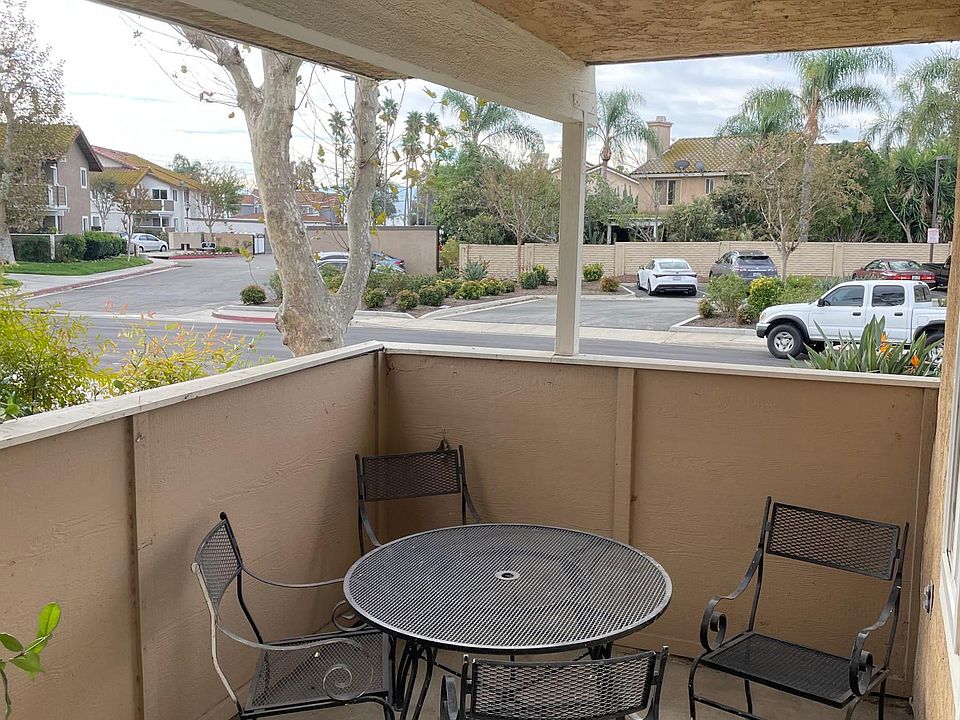 Enclosed patio with outside covered table and seating