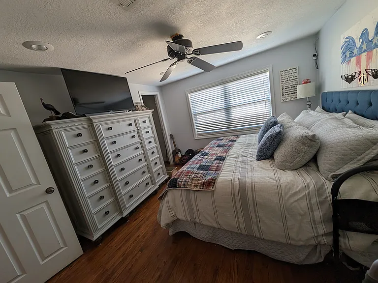 Furnished bedroom w king size bed with attached huge, private bathroom