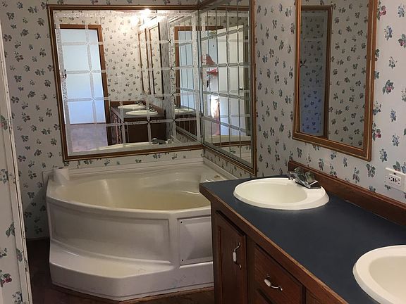 Master Bath has his/her sinks, garden tub, and shower