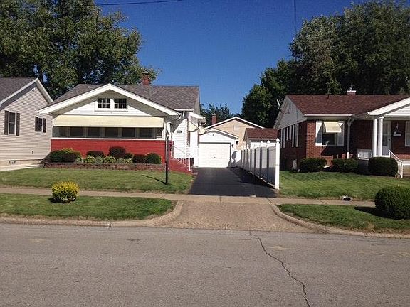 One-car gargage with shelving for storage