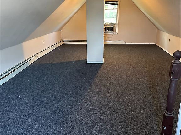 Third floor finished attic very spacious 10' x 20'. Could Beb bedroom playroom family room