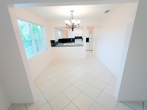 View of Dining Room & Kitchen