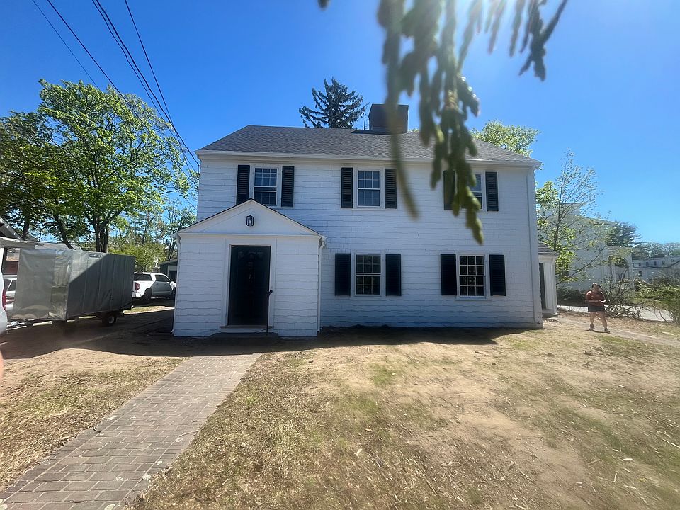 Front of the house, you can't see the sun porch and garage it's that big.