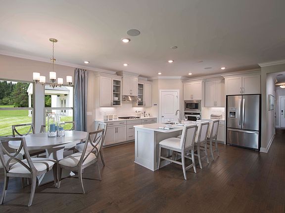 Prep dinner in the kitchen while entertaining guests in the great room.