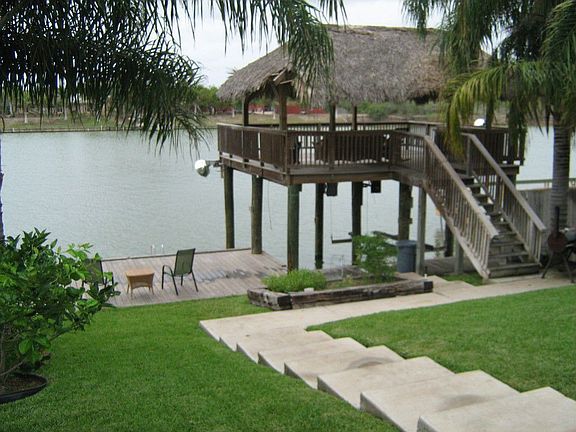 DOUBLE DECKER BOATHOUSE, LIGHTED FISHING PIER, 2 SLIPS, 1 LIFT