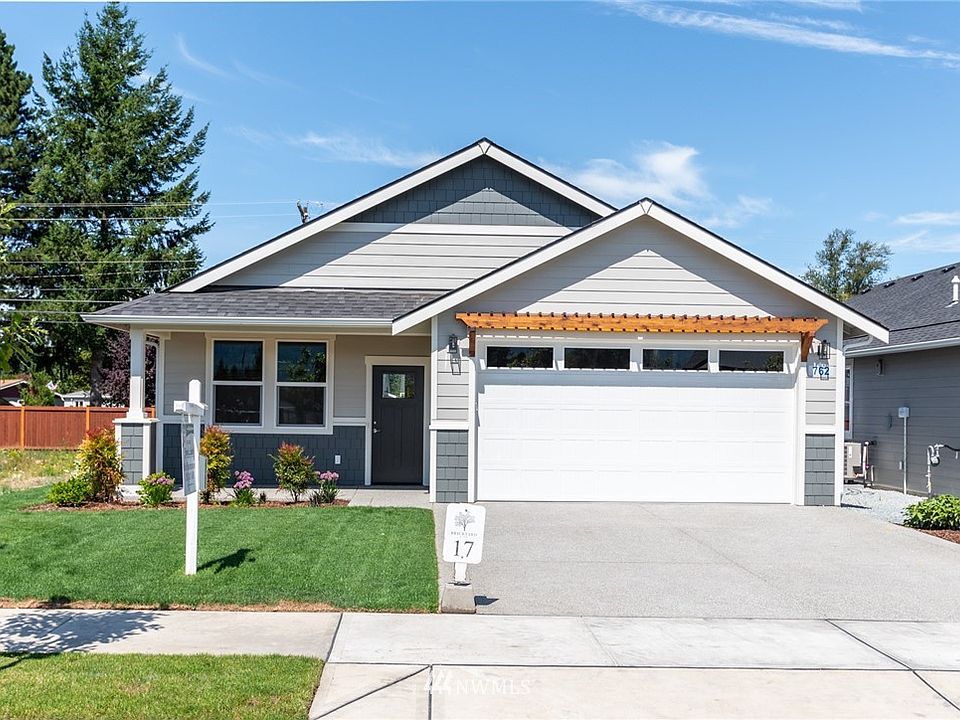 The pictures are of the same floor plan but a different house.  Features, upgrades and colors may differ.  Pictures are for marketing purposes only.