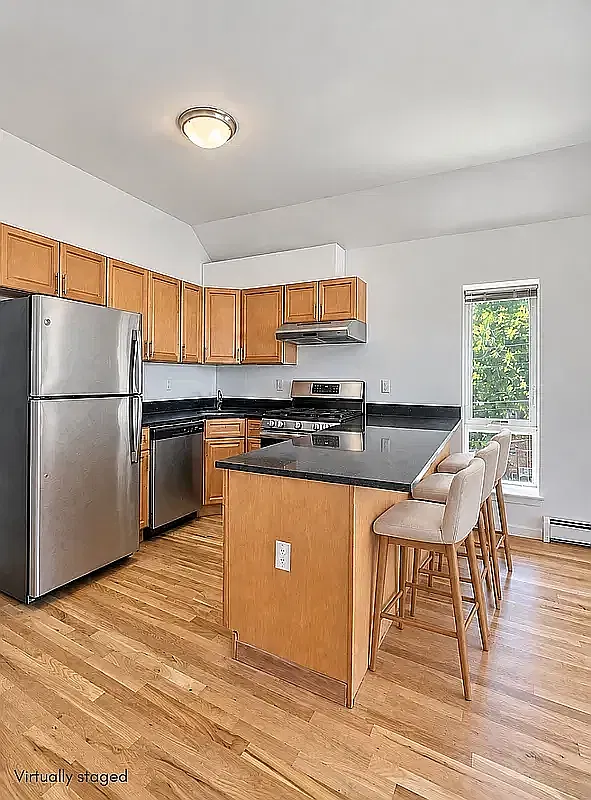 73-02 Ditmars Boulevard — Photo 2