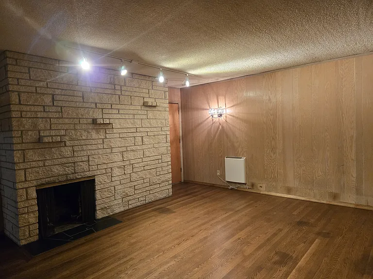 Living room with decorative fireplace