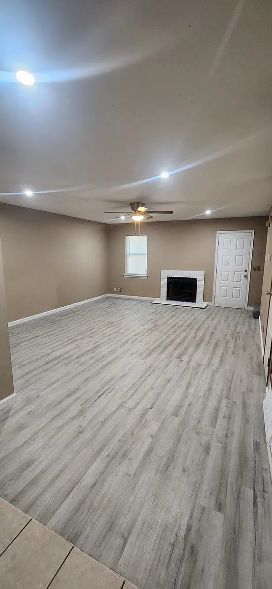 Living room with new Vinyl plank flooring - 2324 Heatherfield Ln