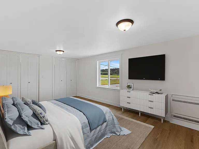 3rd bedroom w/ double closets. Views of farmlands, hills and trees.