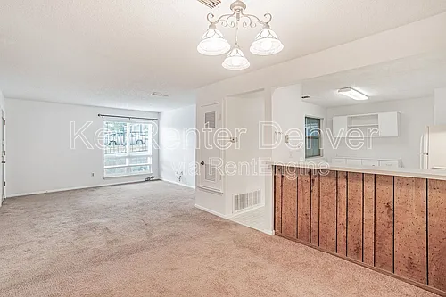 7185 S Gaylord St #E13 Photo 1