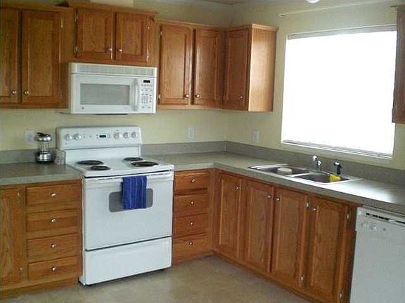 Kitchen Area with Lots and Lots of Cabinet Space and Shelving