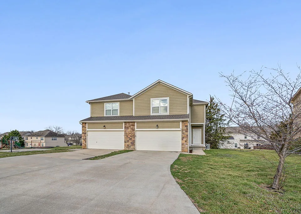 Updated 3 bedroom 2.5 bathroom home with 2 car garage and tons of additional parking!