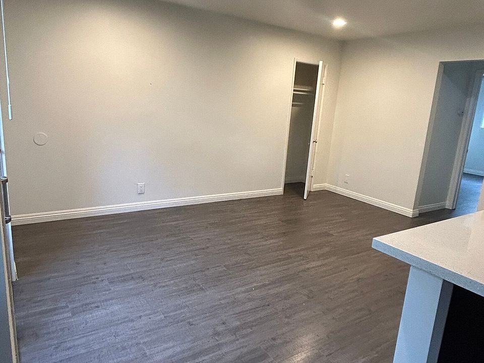 Living room area with storage closet