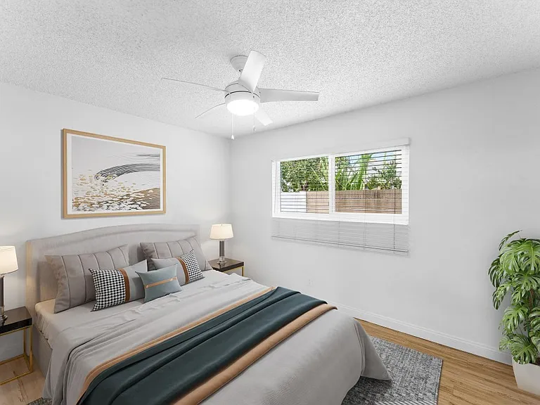 Spacious secondary bedrooms with ceiling fans.