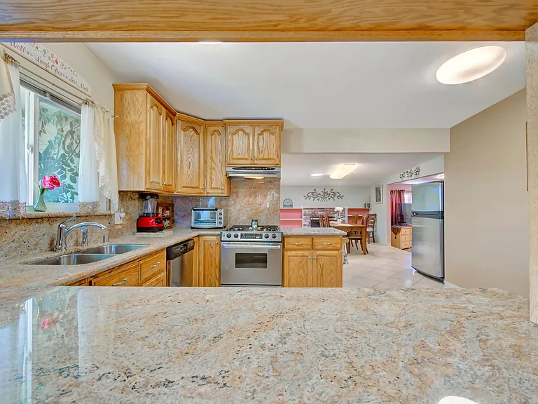 View of kitchen to dining room from the parlor.