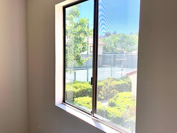 View from bedroom window of tennis court