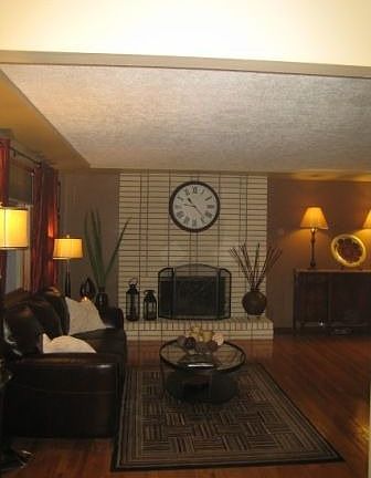 Comfy Living Room with wood burning fireplace