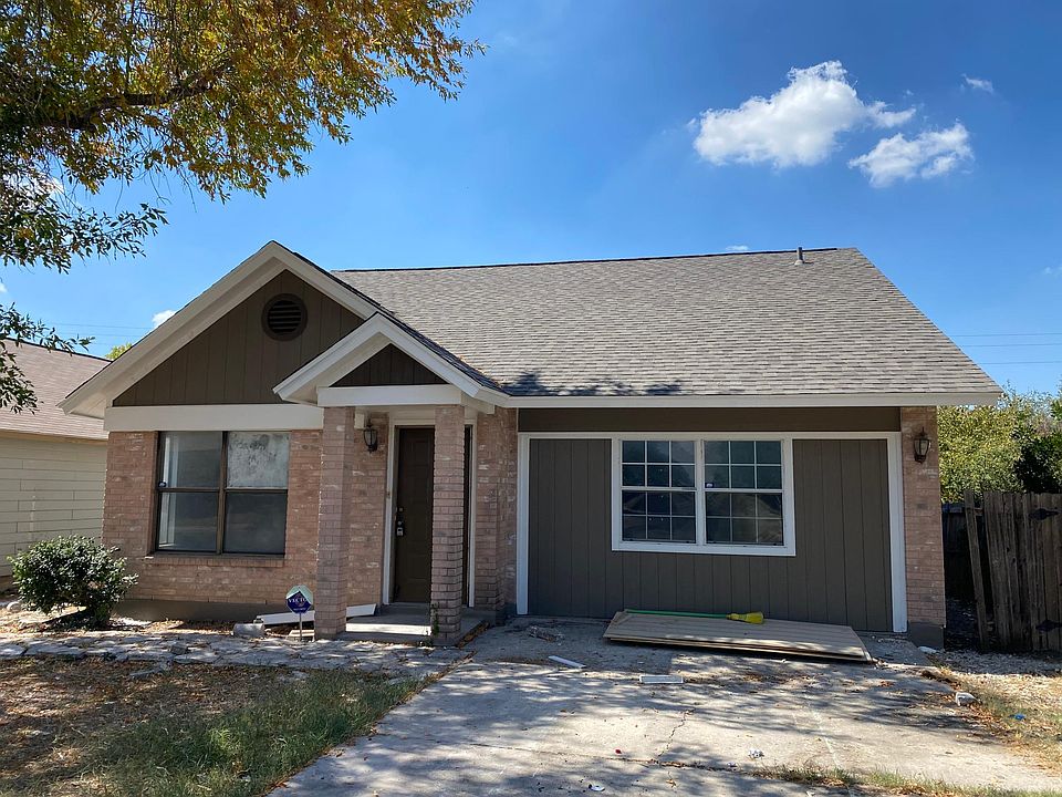 Beautiful curb appeal with new siding, fresh paint, and new roof.