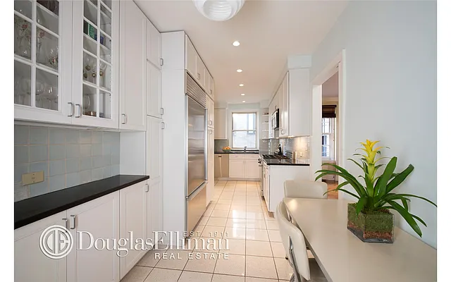 Sold by Douglas Elliman | media 18