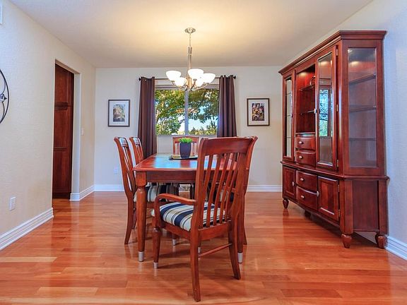 Formal dining room with views of spectacular back yard