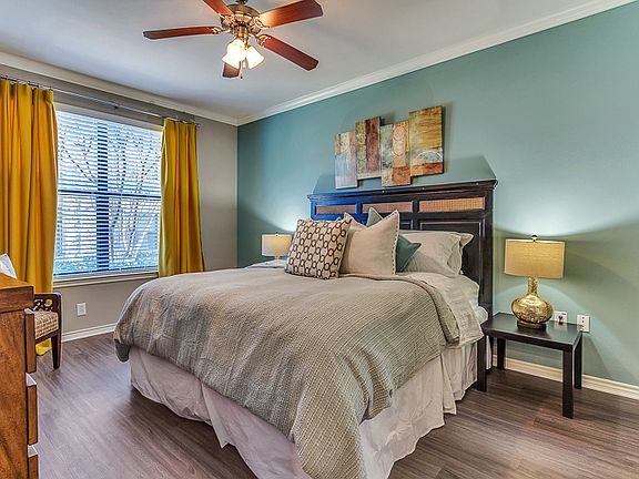 Large Master Bedroom with Lots of Natural Light and hard wood floors