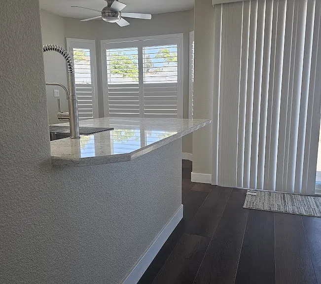 New countertop overhang allows for 3 barstools at the counter