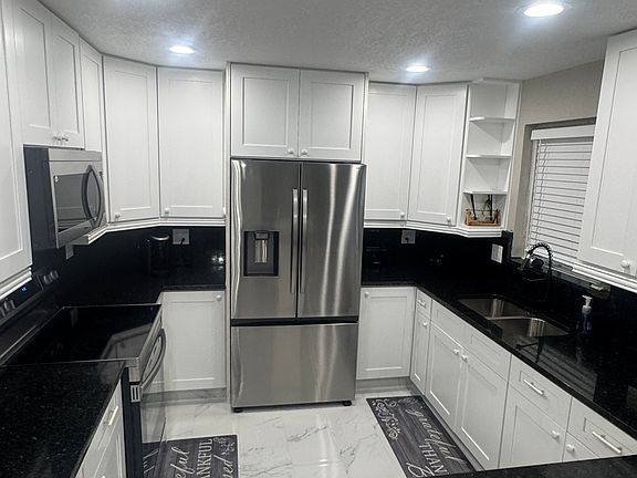 3rd image of 13412 Grand Prix Way #1