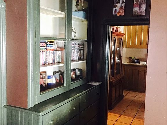A look down the hallway from the living room, headed toward the kitchen