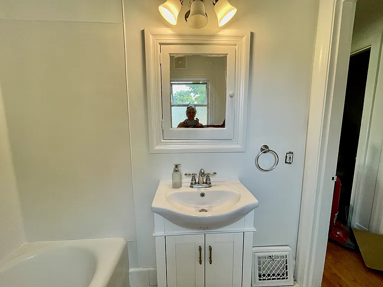 bathroom sink and tub