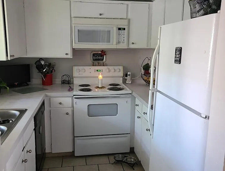11761 E Cedar Ave — Photo 1