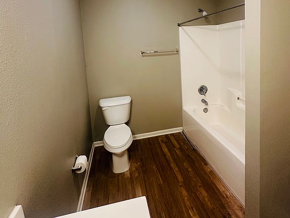 If you're thinking ahead, shower curtain and floormats would be ideal. Otherwise spacious bathroom.