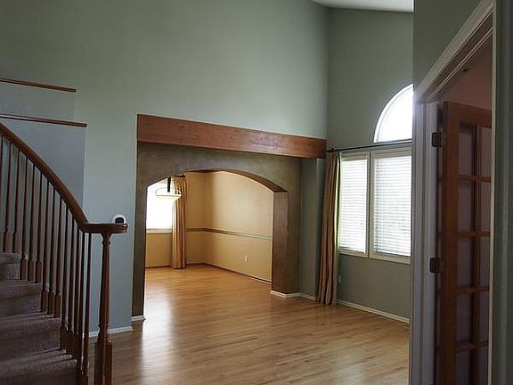 Entryway view 4 with Living room and dining room