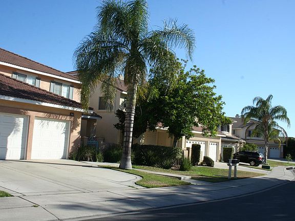 FRONT OF THE HOUSE with a 3 car Garage