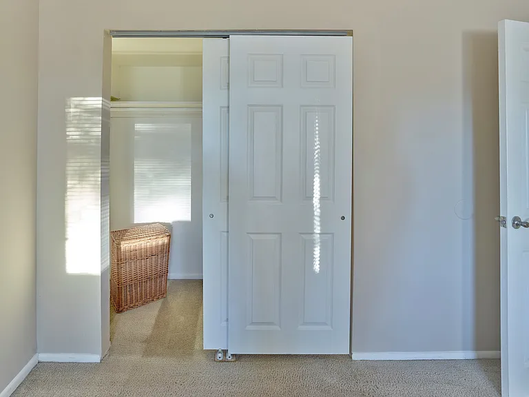 Enjoy ample closet space with sliding doors and built-in shelving at Haynes Run Apartments in Medford, NJ.