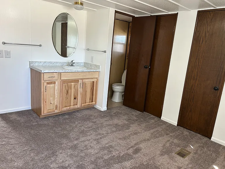 Bedroom with half bath