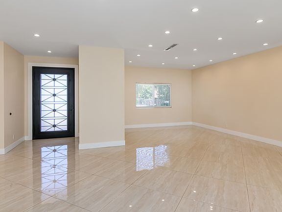 Steel entry door with decorative artwork. .