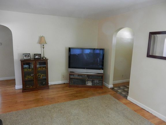 Living room and front entry.