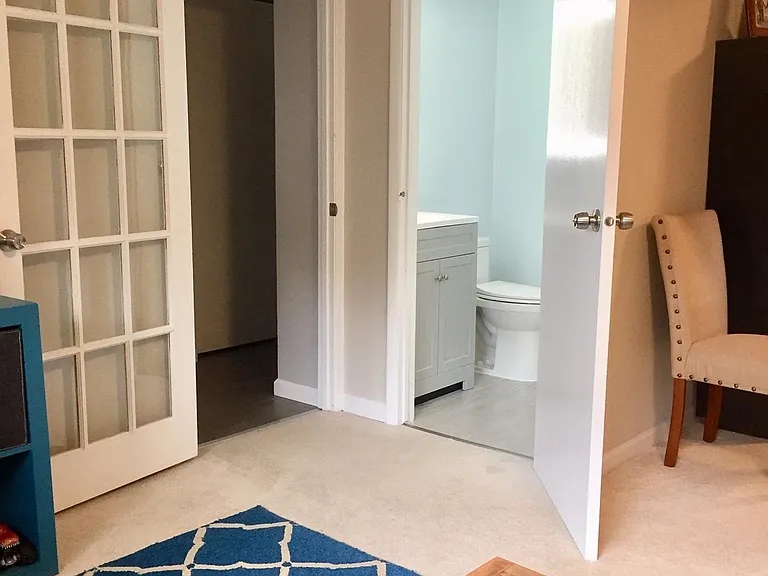 Half bath off family room, downstairs.