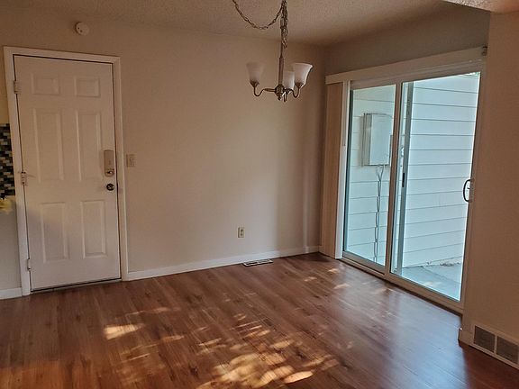 Dining room with easy access to front patio and attached one car garage