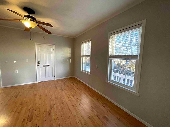Living room with large window with lots of natural light coming in